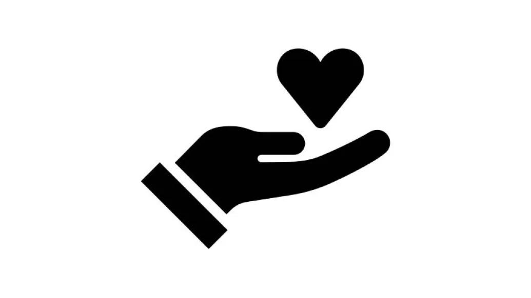 black ink illustration of hand holding heart