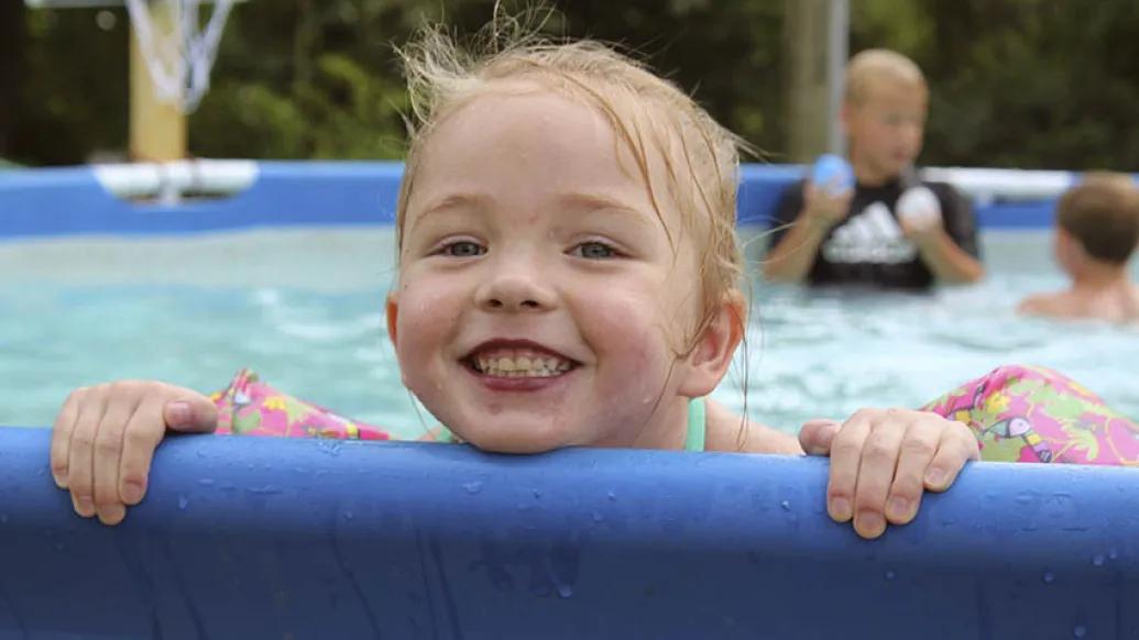Little girl in swimming pool