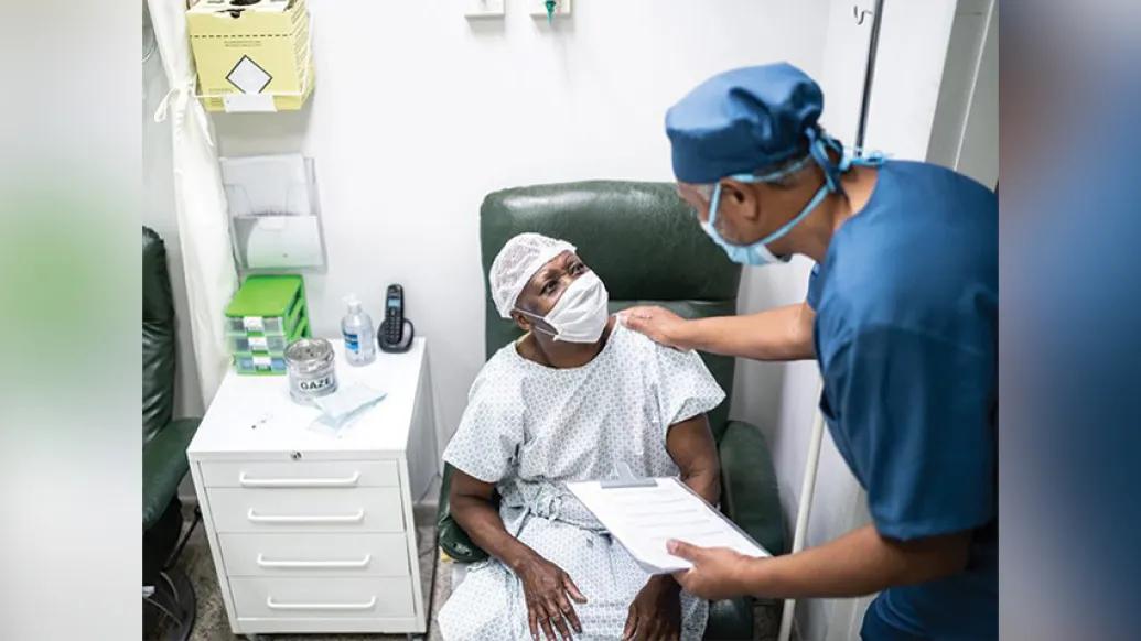 man hospital room doctor mask