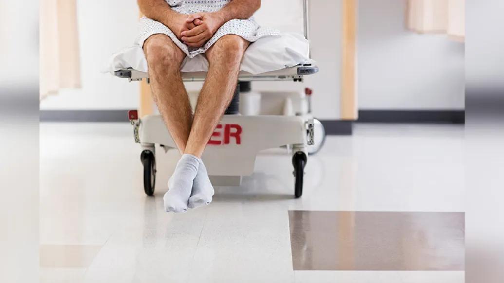 man legs hospital socks bed