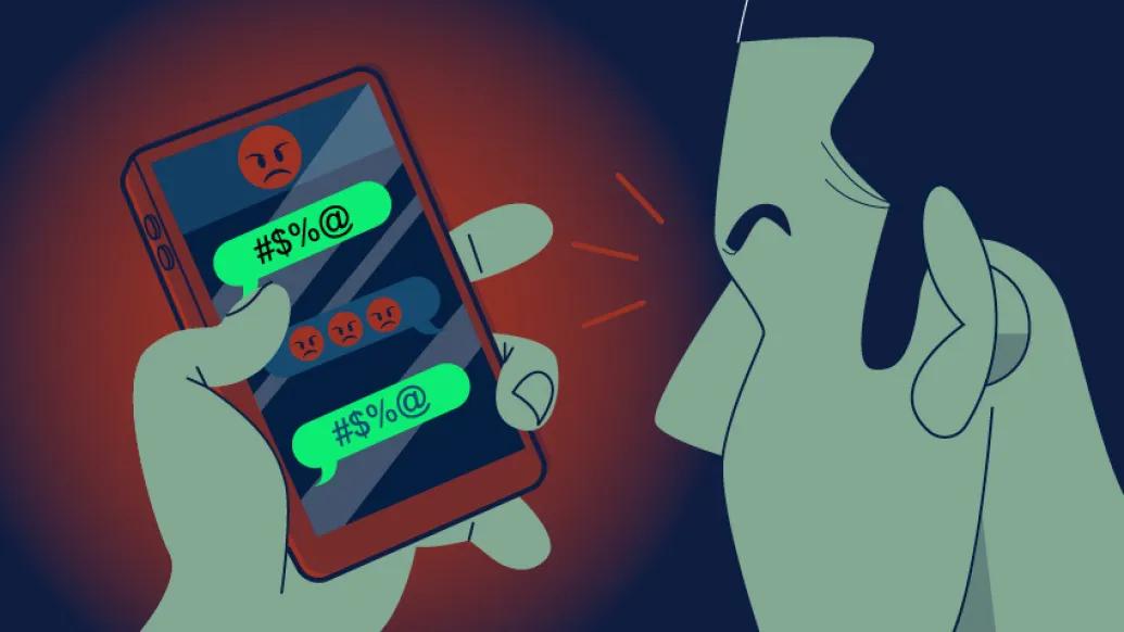 man looking at cell phone conversation with angry emoji in red and green
