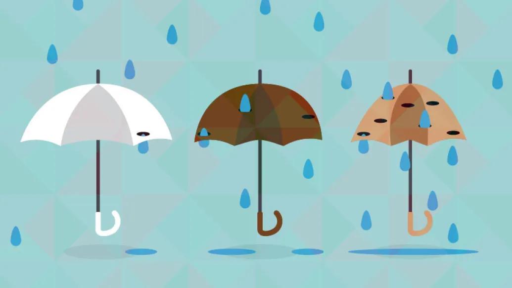 Umbrellas with holes and rain