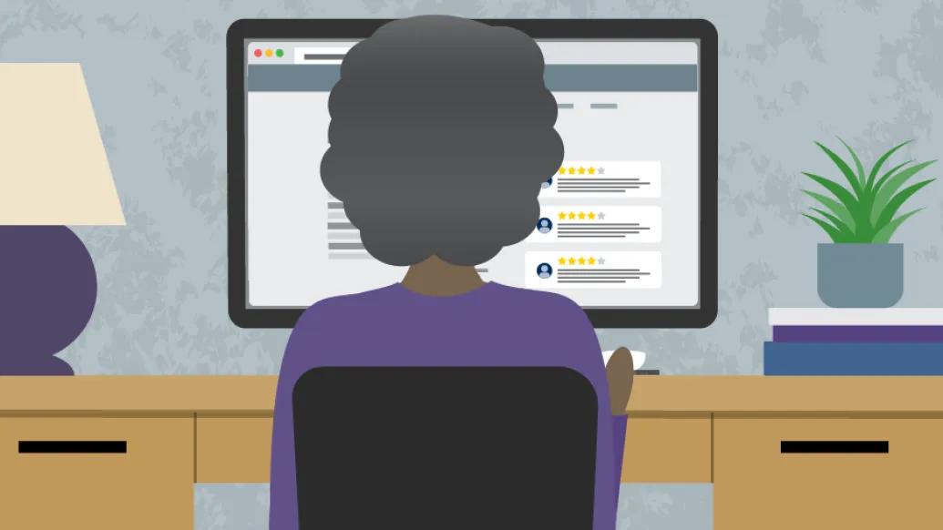 woman on computer in room