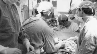 Doctors perform a heart transplant in the operating room in 1968