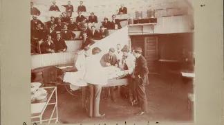 George Dock demonstrates to medical students