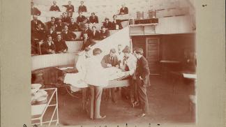 George Dock demonstrates to medical students