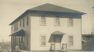early 1900s photo of the exterior of the dermatology hospital
