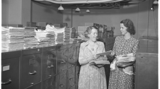 1934 photo of women working in the hospital records room