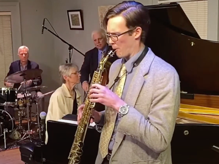 a group of musicians playing Jazz music