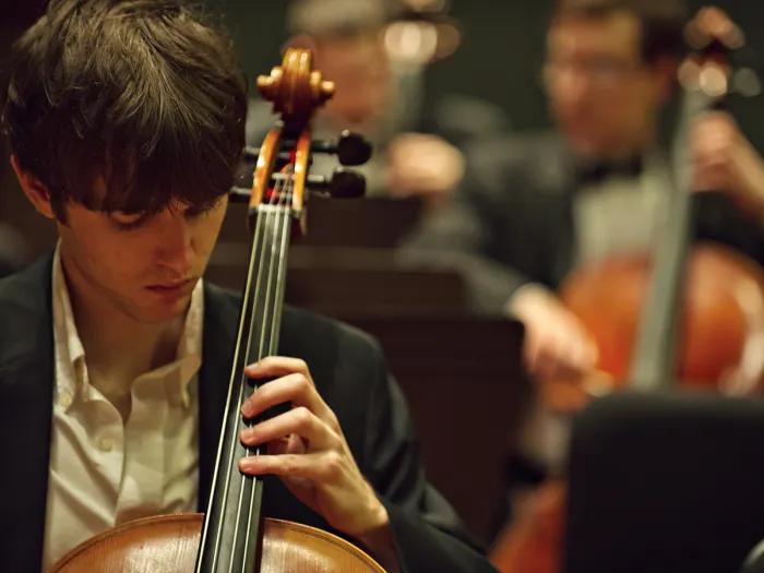 A cellist performs with the Life Sciences Orchestra