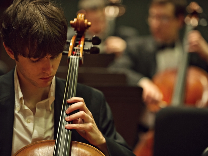A cellist performs with the Life Sciences Orchestra
