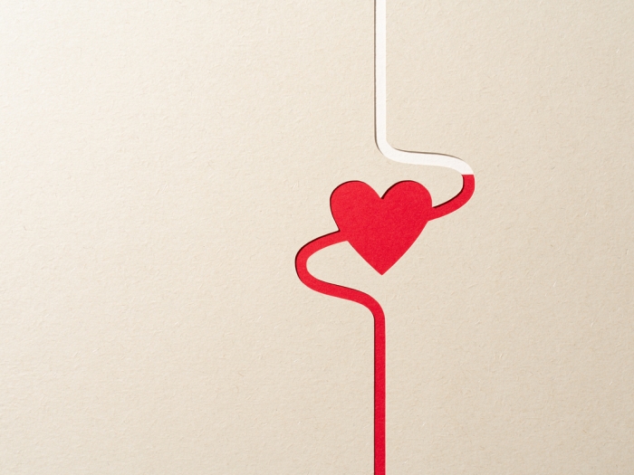 red lines with heart through it beige background