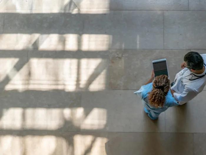 Aerial view of student and teacher in medical setting