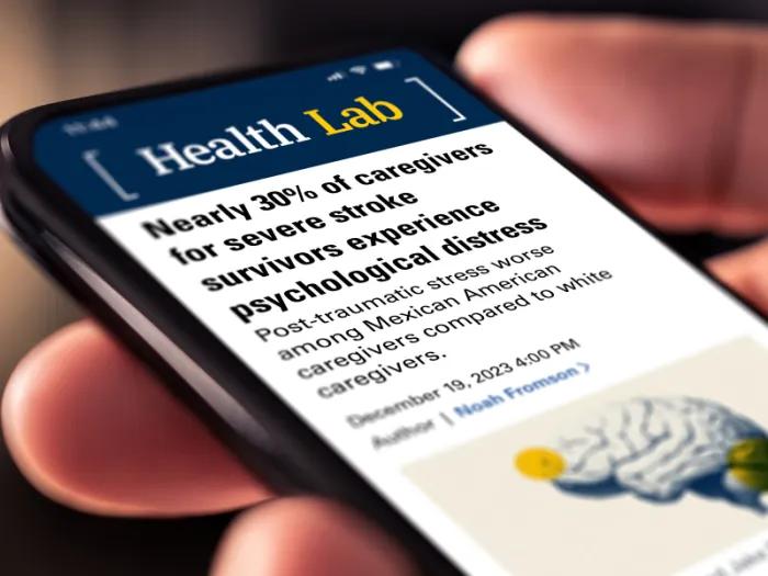 article on phone being read by person