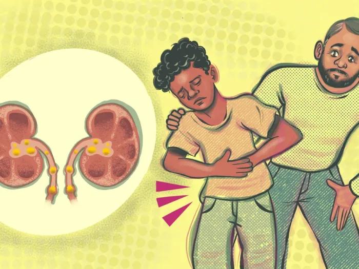 Child grasps stomach area because of kidney stones