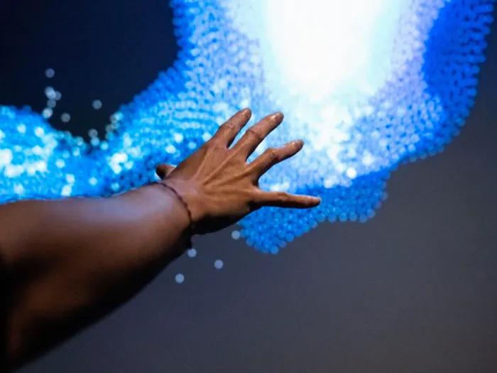 blue image person reaching
