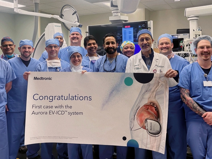 Ali Sheikh, D.O., celebrates with Sparrow’s highly skilled cardiovascular team after becoming the first health system in Michigan to implant the innovative Aurora EV-ICD device defibrillator.