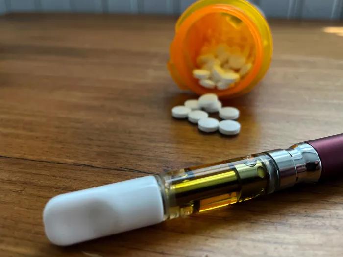 pills spilling out of bottle 