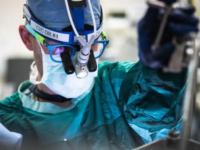 A surgeon performing a procedure in the CVC