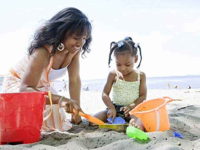 Mother and Child Playing in Sand