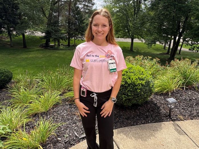 Olivia Ohmer smiling before starting her shift at Mott