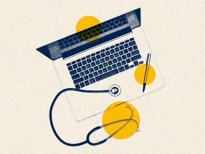 laptop with stethoscope on it and a pen yellow dots and grainy white background and navy accents