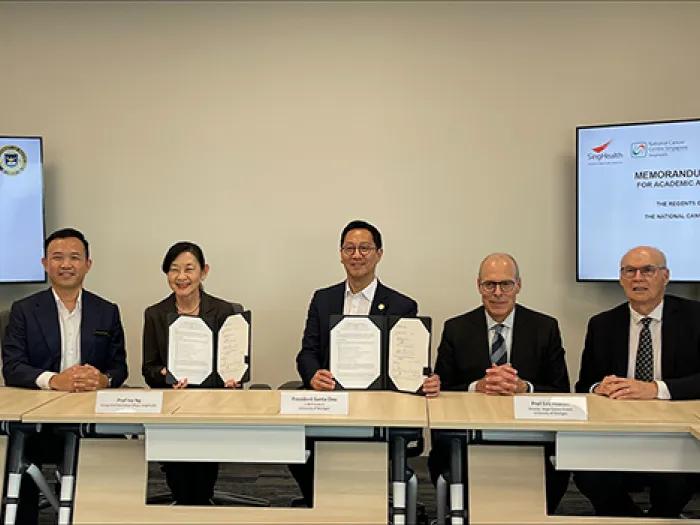 Signing an institutional agreement with the National Cancer Centre of Singapore (NCCS). NCCS leadership from left: Deputy Chief Executive Officer for clinical operations Lim Soon Thye; NCCS Chief Executive Officer William Hwang; and Ivy Ng, Group Chief Executive Officer for Singapore Health Services.