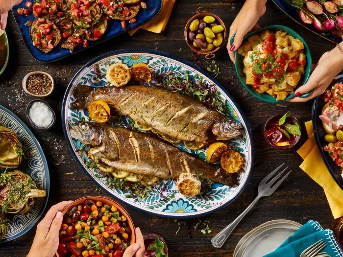 fish dinner Mediterranean food on table 