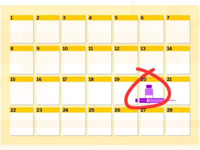 Calendar with vaccination date circled in red