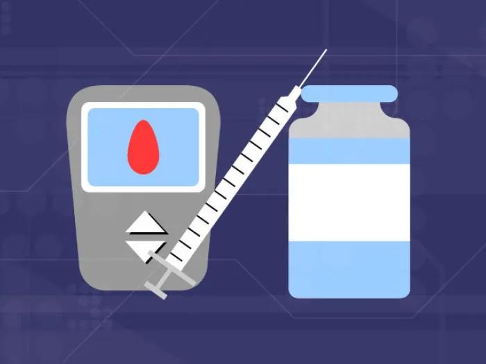 diabetes monitor, syringe and bottle