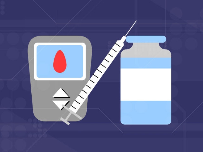 diabetes monitor, syringe and bottle