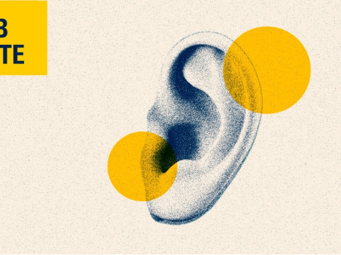 ear with lab note in yellow and blue
