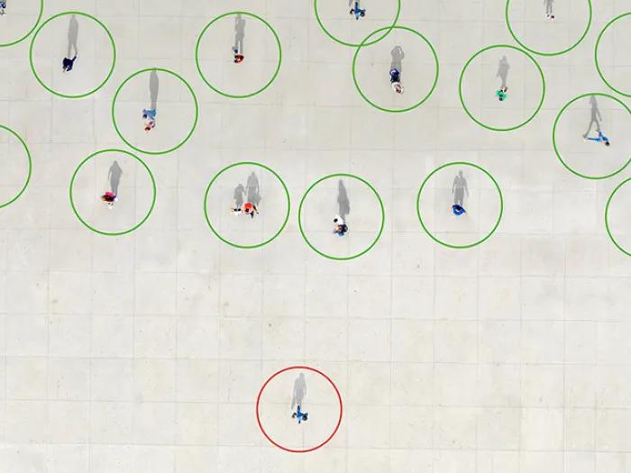 figure walking away in red circle and tons ahead in green circles