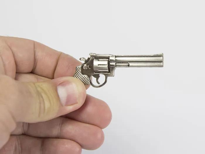 hand and little gun
