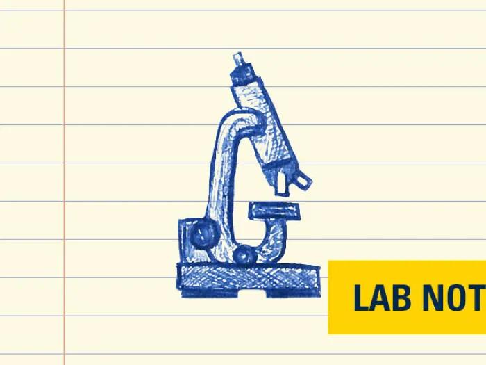 stethoscope drawing in blue ink on lined paper with lab note writing on bottom right in yellow and navy