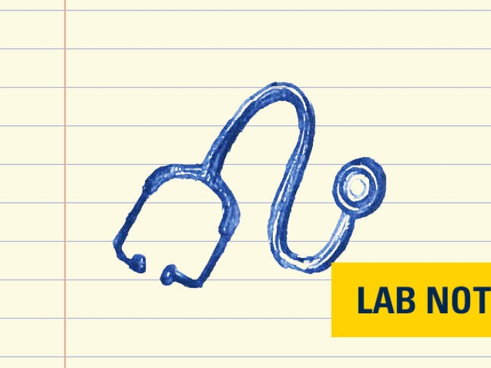 stethoscope drawing in blue ink on lined paper with yellow badge in bottom corner in blue font saying lab note