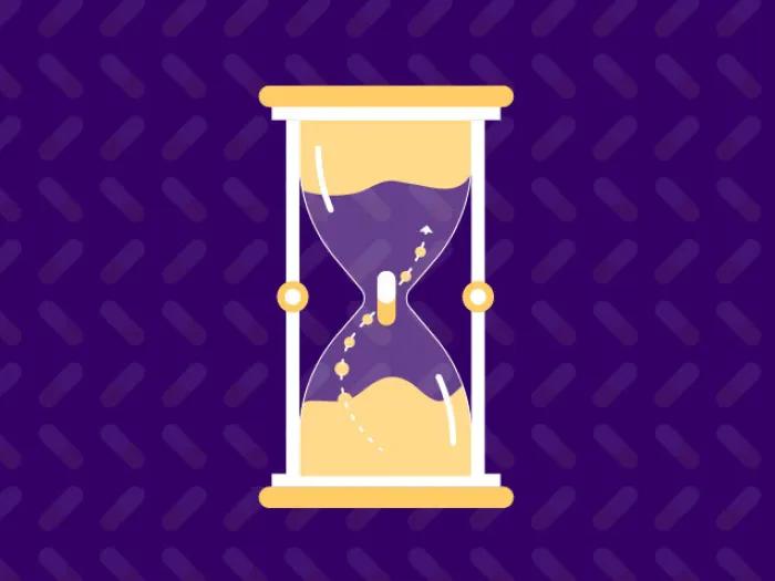 yellow sand clock on dark blue background