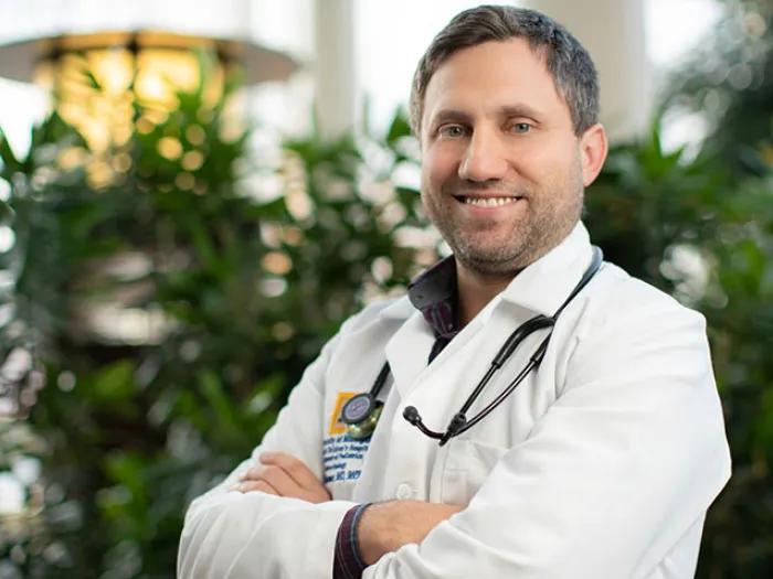 Daniel Shumer, M.D. posing in lobby