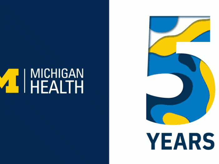 michigan health blog logo in michigan univ colors and 5 years on right with confetti falling in light blue dark blue yellow and white