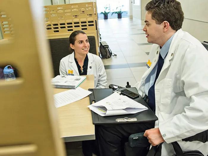 Michigan med doctors having a discussion