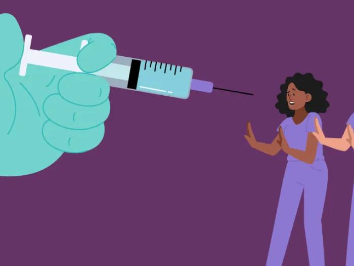 nurses retreat from glove hand with vaccine