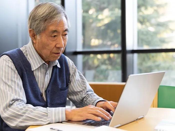 Older gentleman on computer