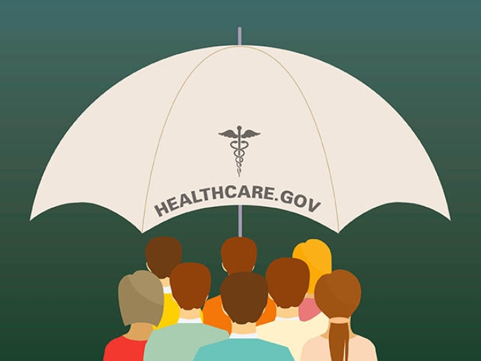People standing under umbrella