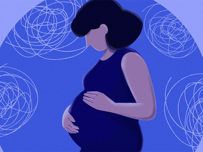 Pregnant woman holding her stomach looking down, surrounded by blue spirals