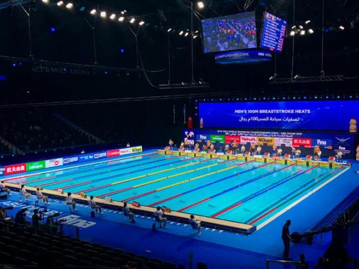 stadium swim pool water lights in dark on