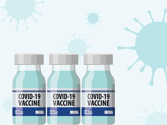 three vials of covid virus background in light blue with light blue germs flying around