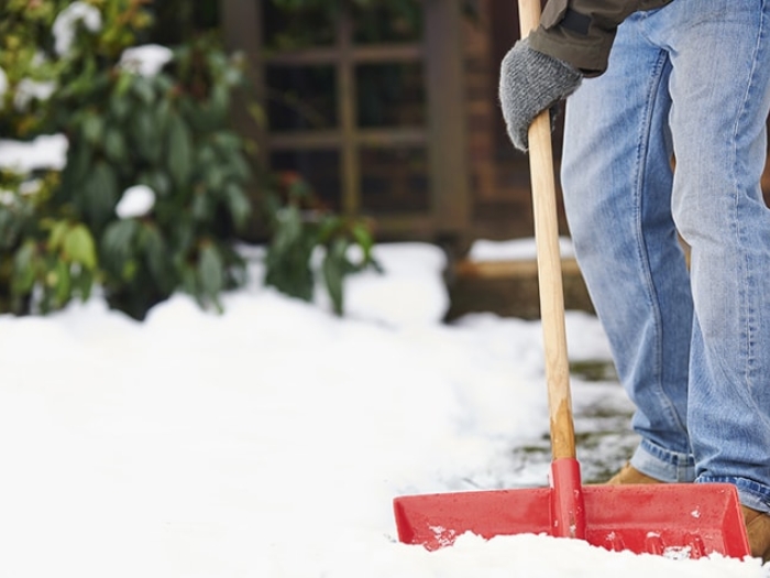 A man shoveling snow