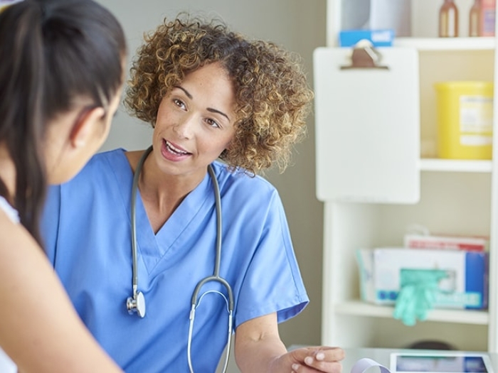 Doctor and patient talking about breast cancer second opinions