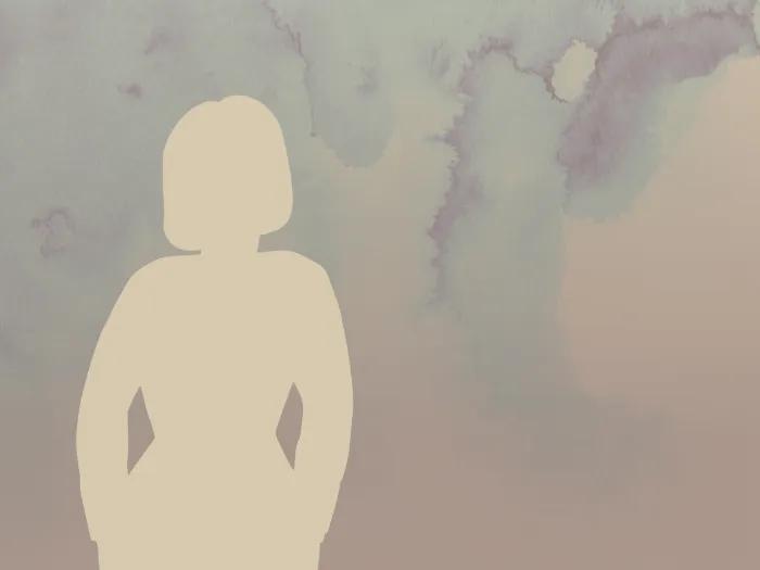 A woman suffering from early stage breast cancer side effects