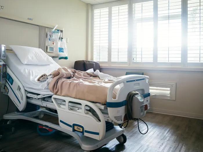 vacant hospital room bed